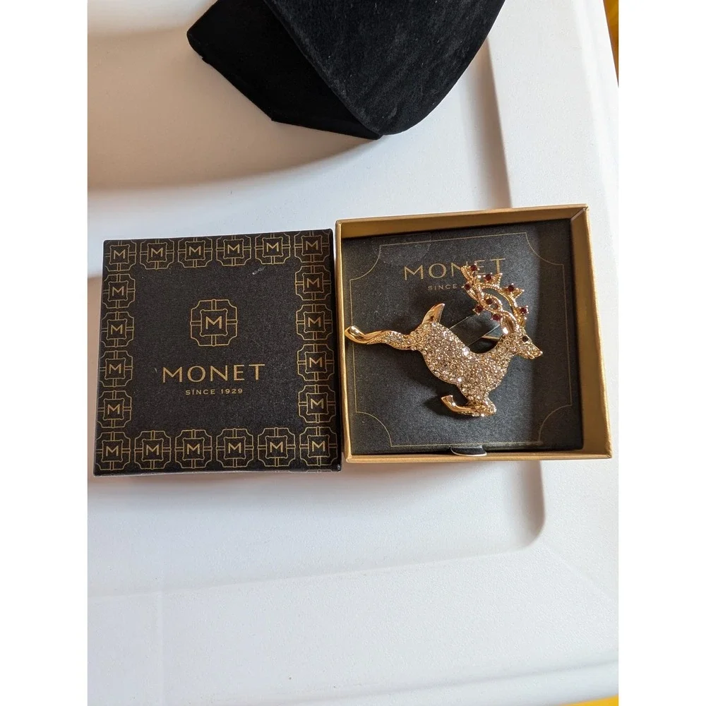 VINTAGE MONET SIGNED Leaping Christmas Reindeer Red Clear Rhinestone Brooch Pin‎
